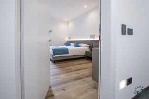 Colchones con pillow-top, minibar y caja de seguridad en la habitación 