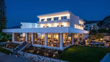 Breakfast, lunch, dinner served; international cuisine, pool views