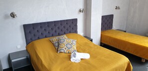 Habitación triple superior | Caja de seguridad en la habitación, cunas gratuitas y wifi gratis