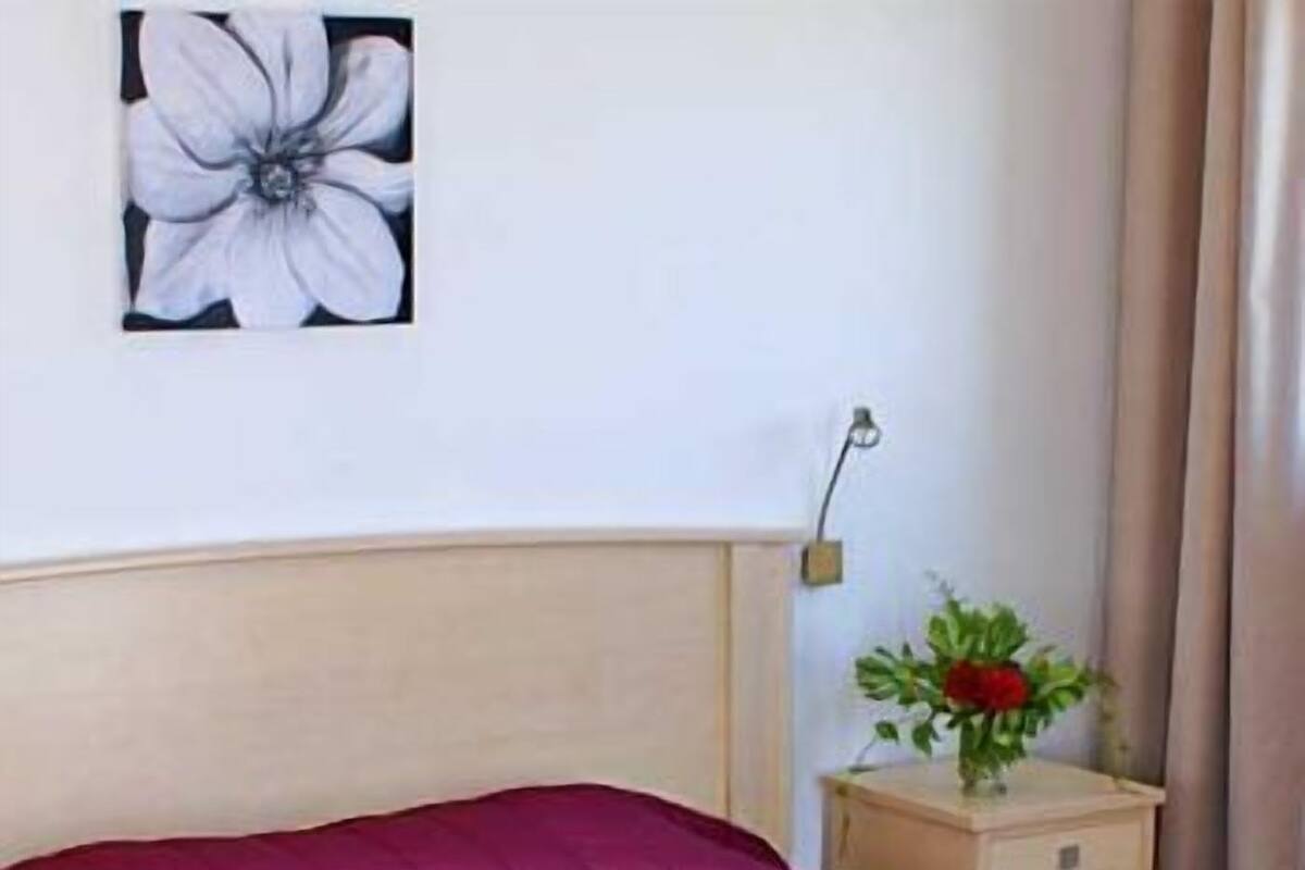 Desk, blackout curtains, iron/ironing board, rollaway beds
