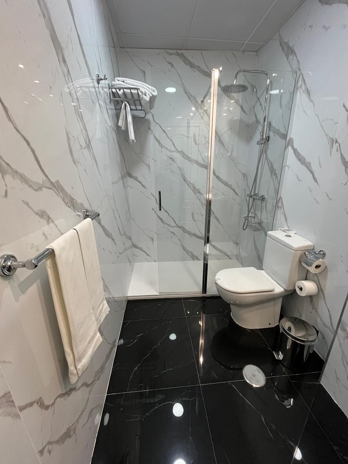 shower, designer toiletries, hair dryer, bathrobes