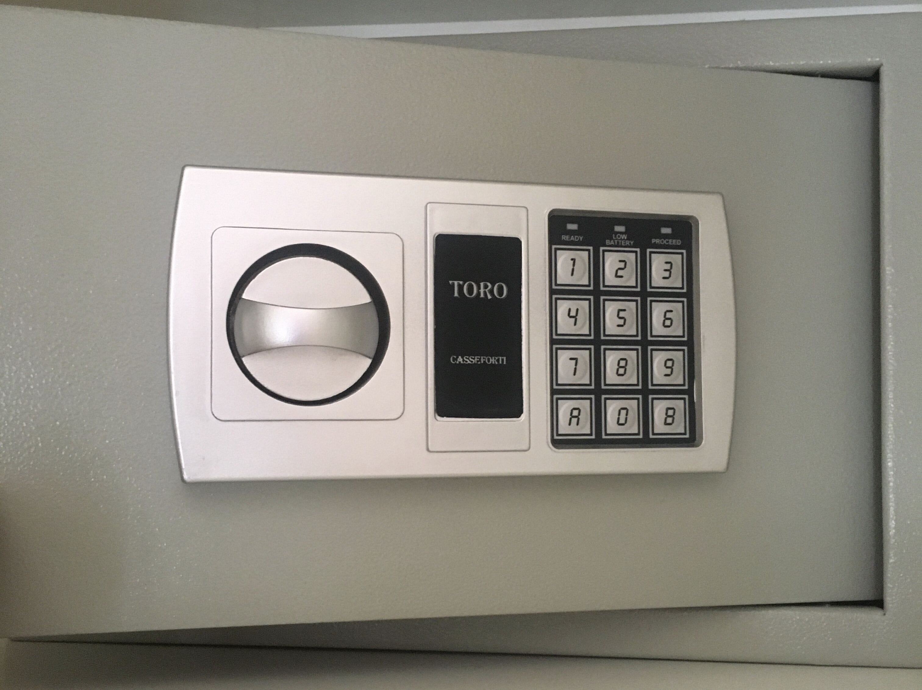 A TOYO card reader with a keypad and a card slot.