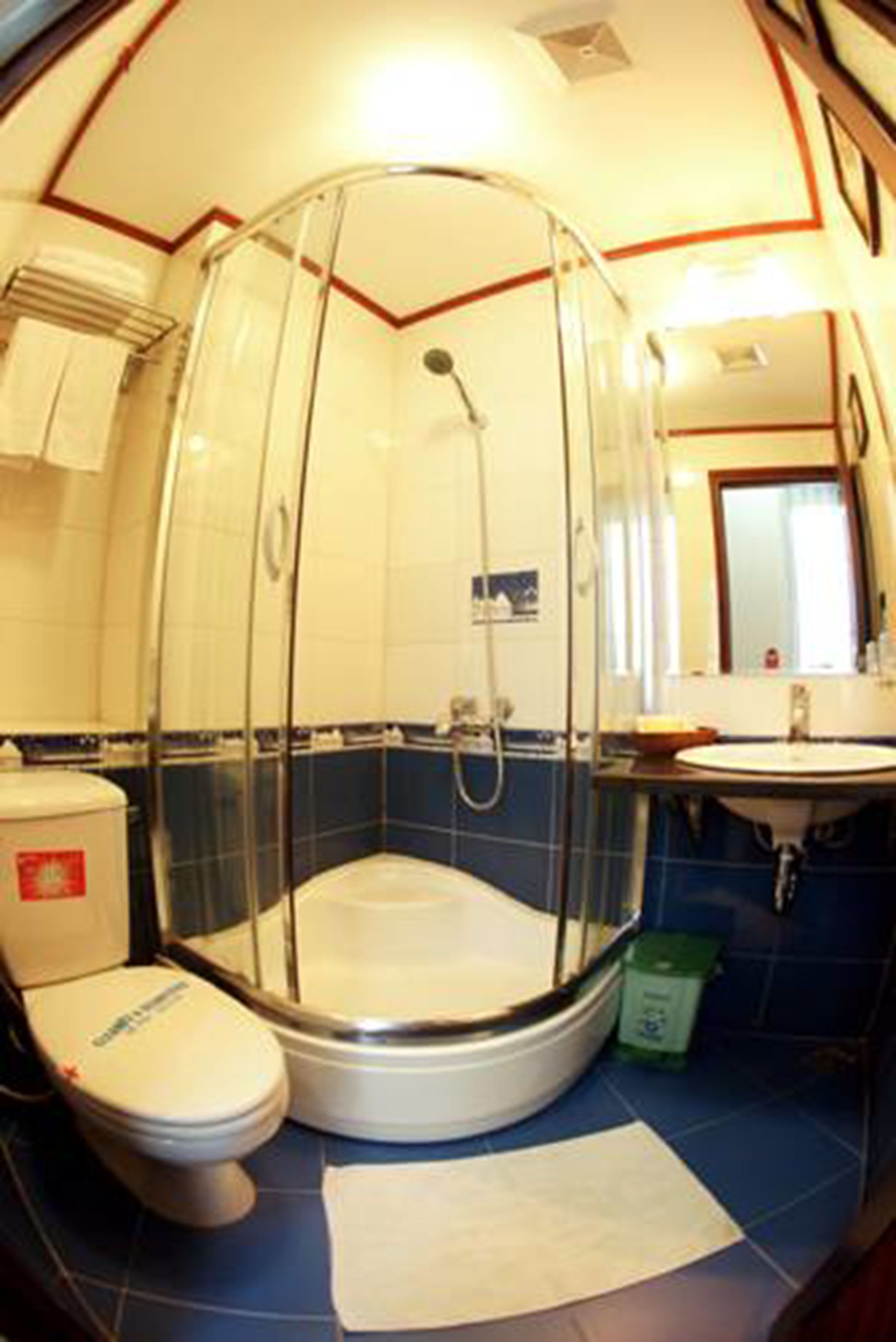 shower, free toiletries, hair dryer, slippers