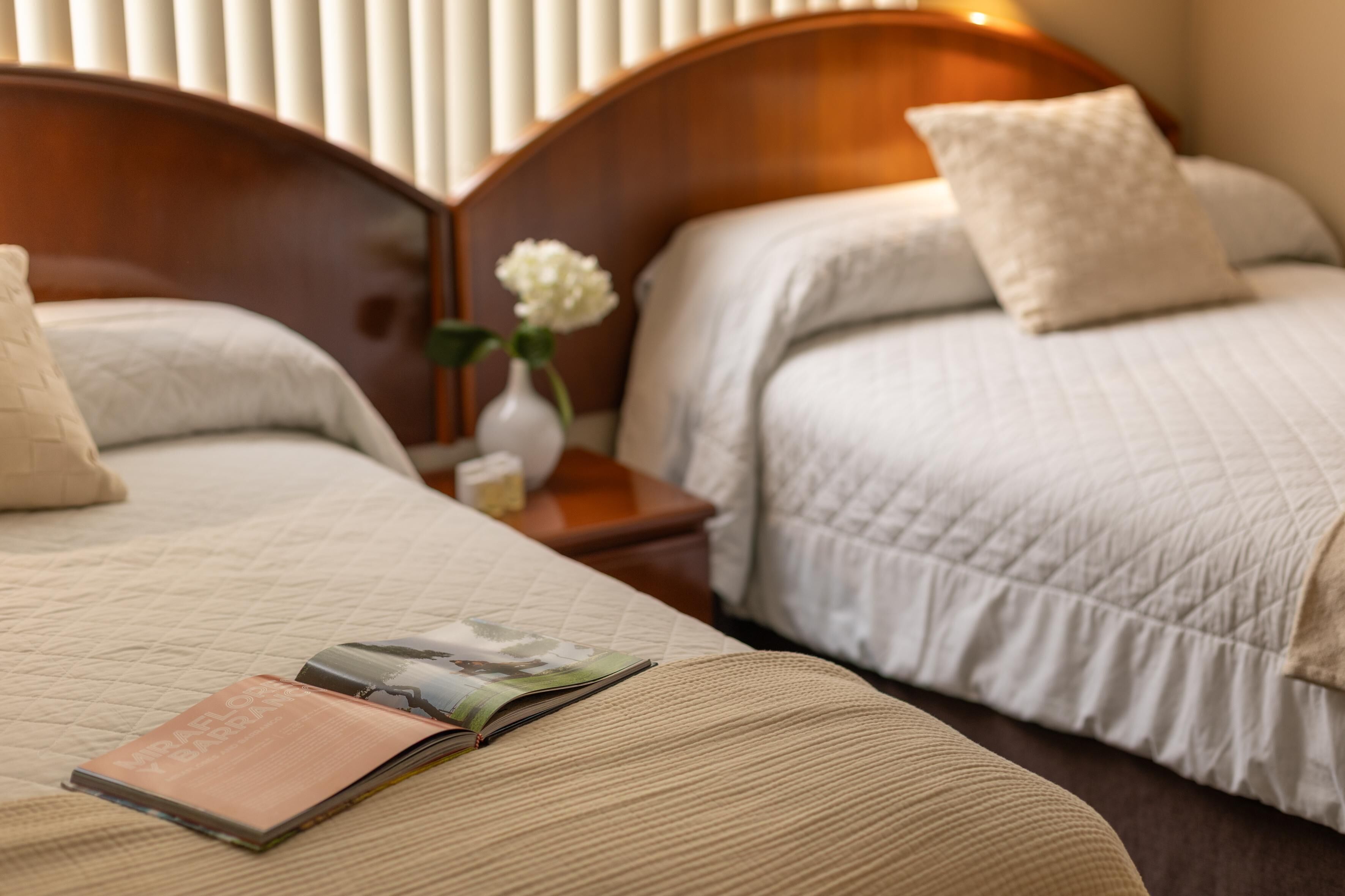 Down duvets, minibar, in-room safe, laptop workspace