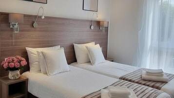 Standard Room, 2 Twin Beds | Desk, iron/ironing board (on request), cribs (free), WiFi (free)