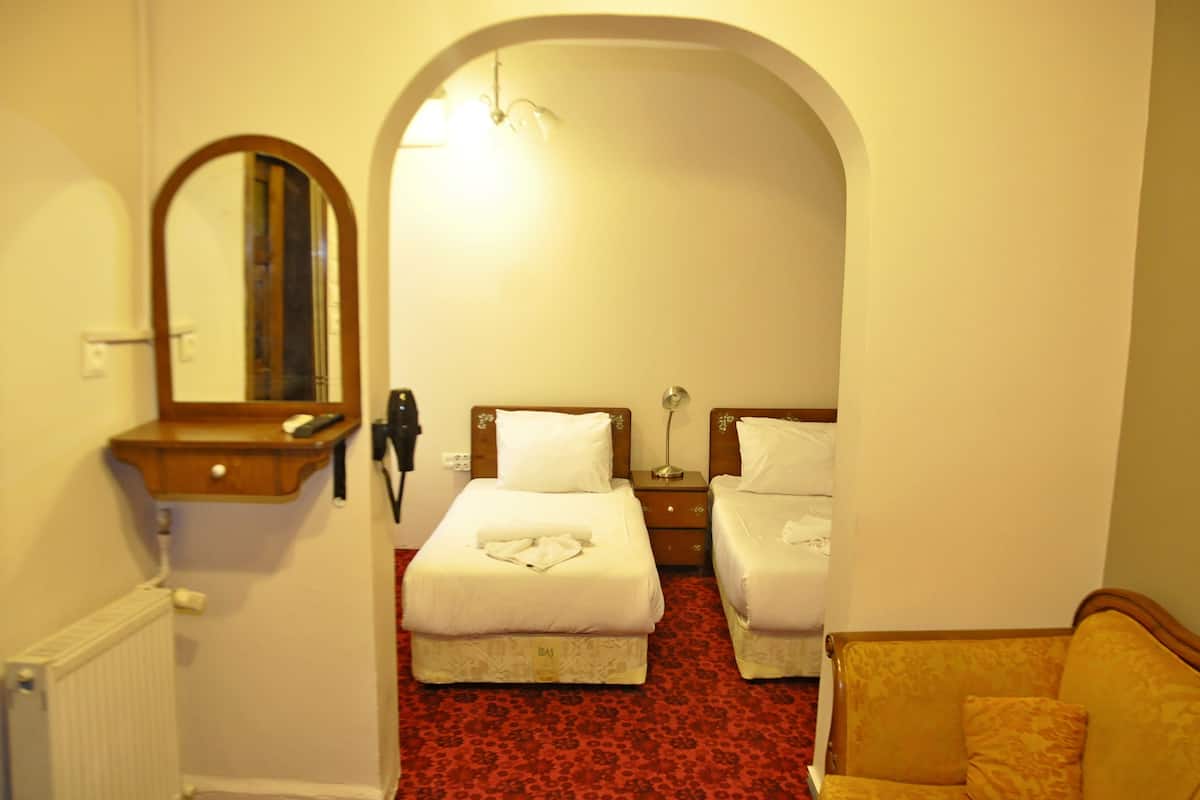 Standaard Twin kamer, 2 eenpersoonsbedden | Een strijkplank/strijkijzer, gratis wifi, beddengoed