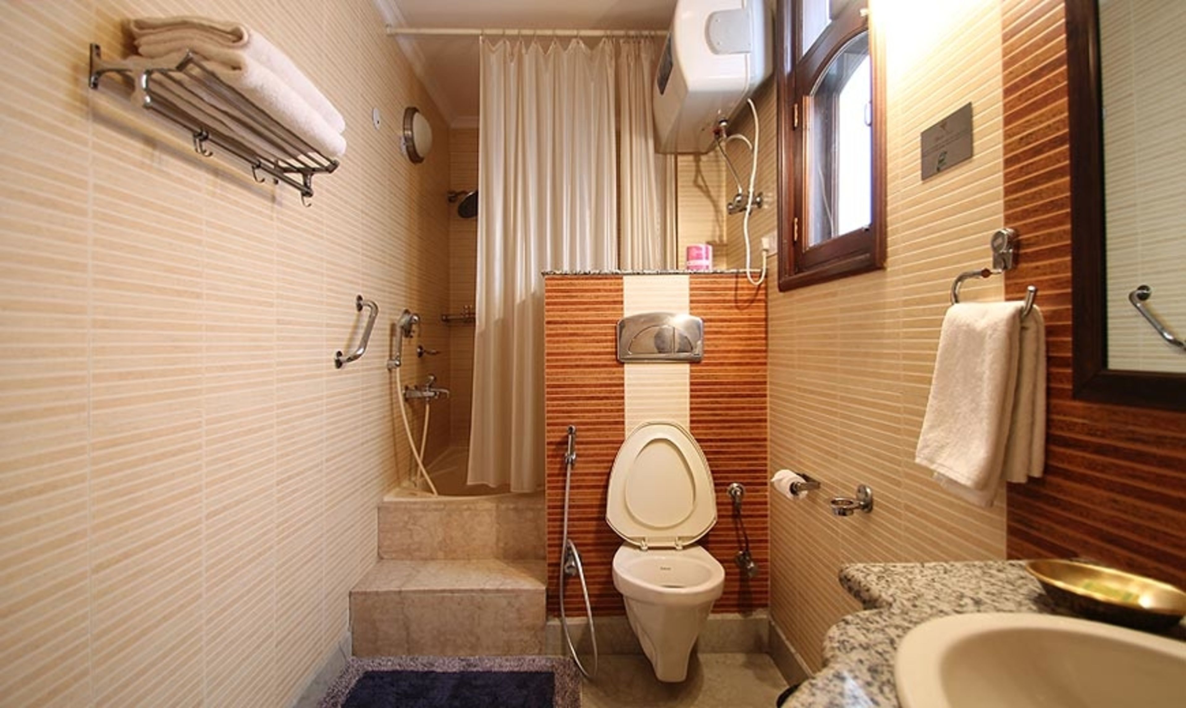 shower, free toiletries, hair dryer, towels