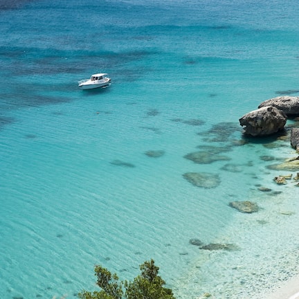 On the beach, sun loungers, beach umbrellas, beach towels