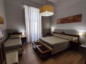 Family Quadruple Room | In-room safe, desk, blackout drapes, soundproofing