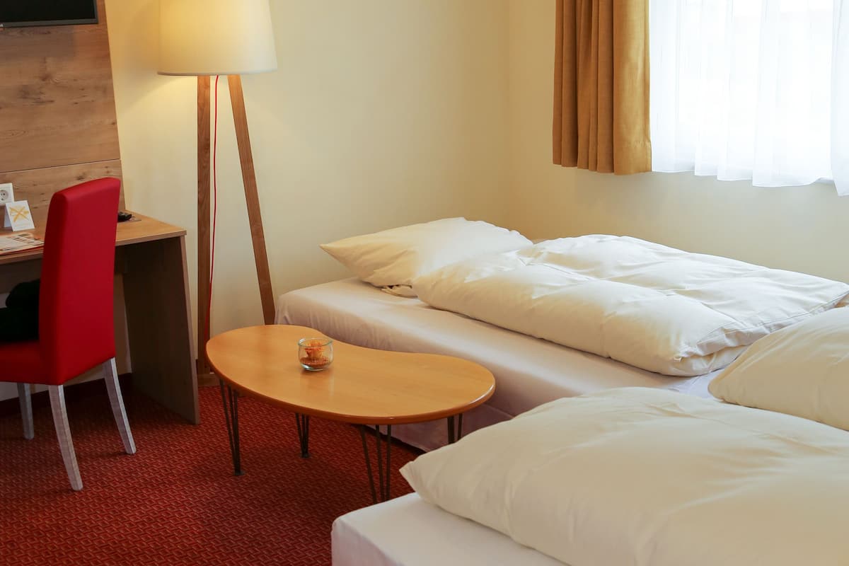 Family Room | Hypo-allergenic bedding, in-room safe, desk, iron/ironing board