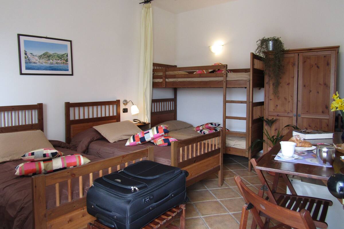 Quadruple Room | Pillowtop beds, in-room safe, desk, soundproofing