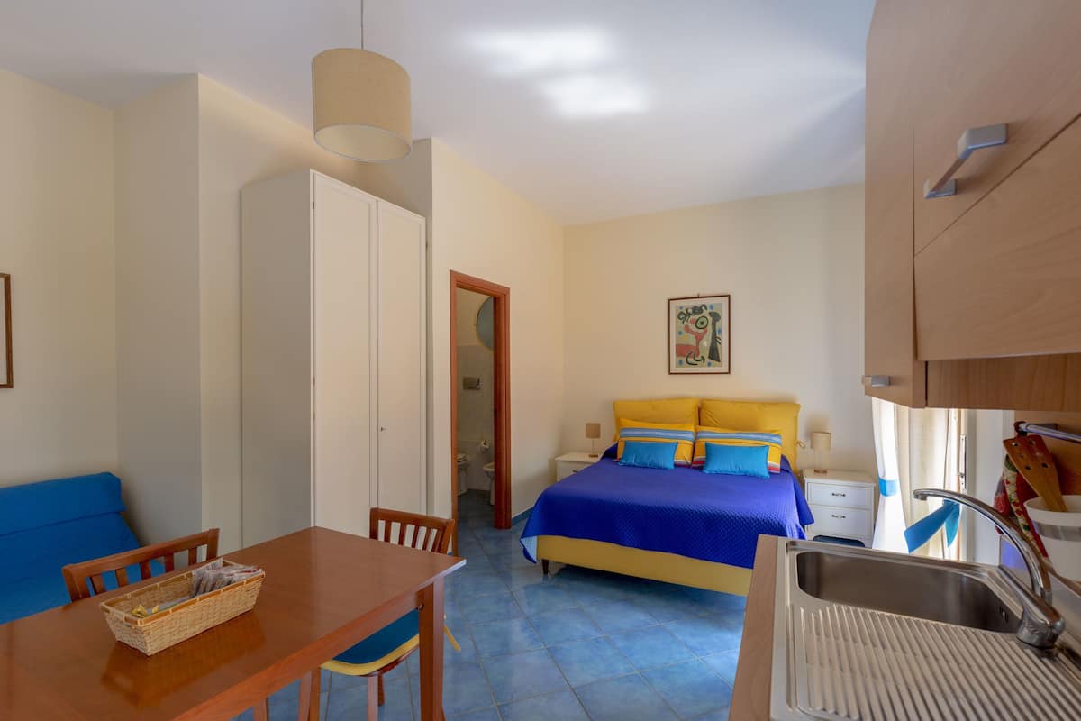 Premium bedding, desk, blackout curtains, iron/ironing board