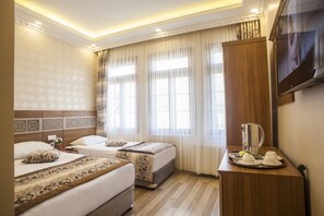 Ropa de cama de alta calidad y minibar 