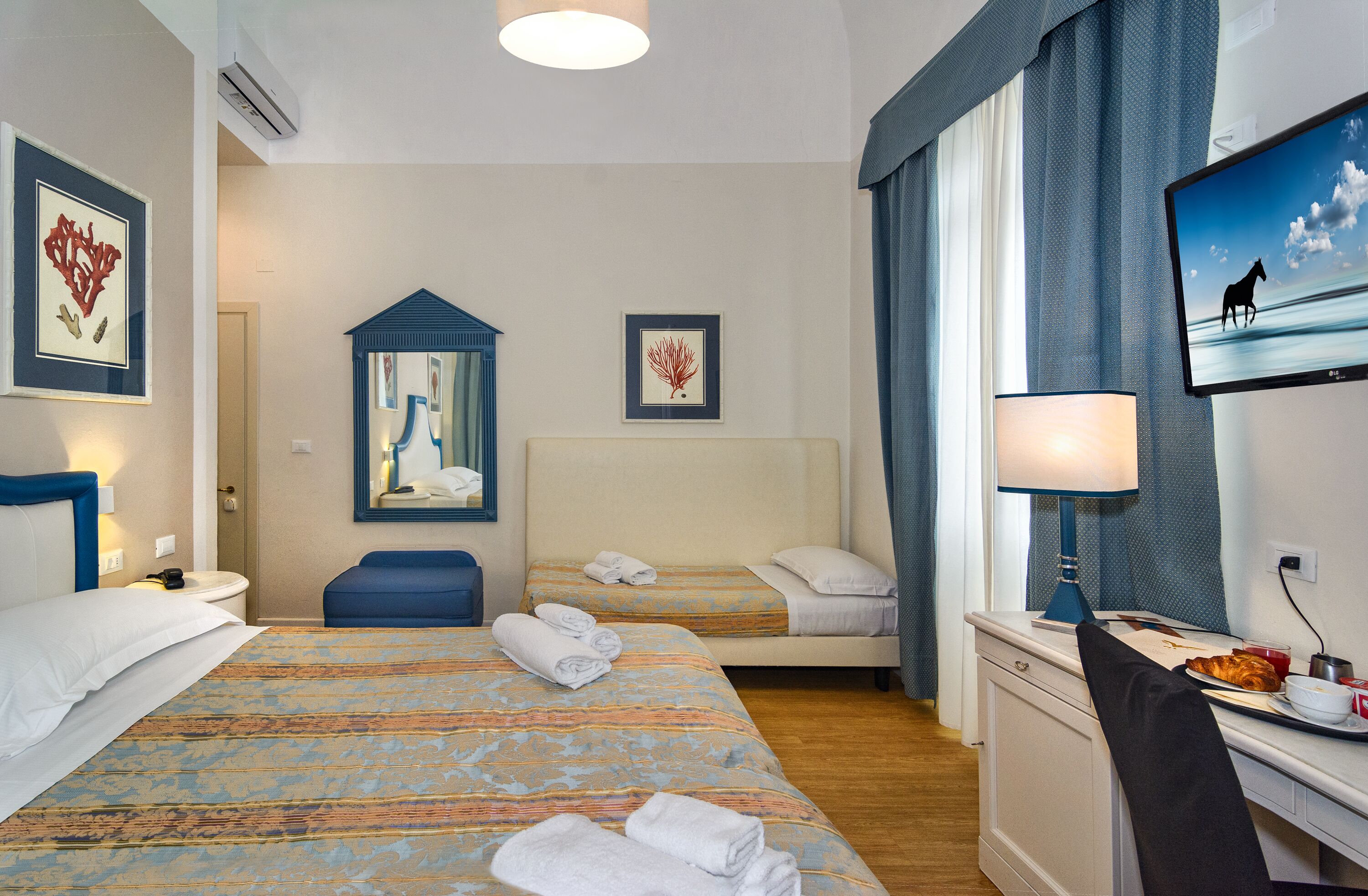 triple room, sea view | hypo-allergenic bedding, minibar, in-room safe, free wifi