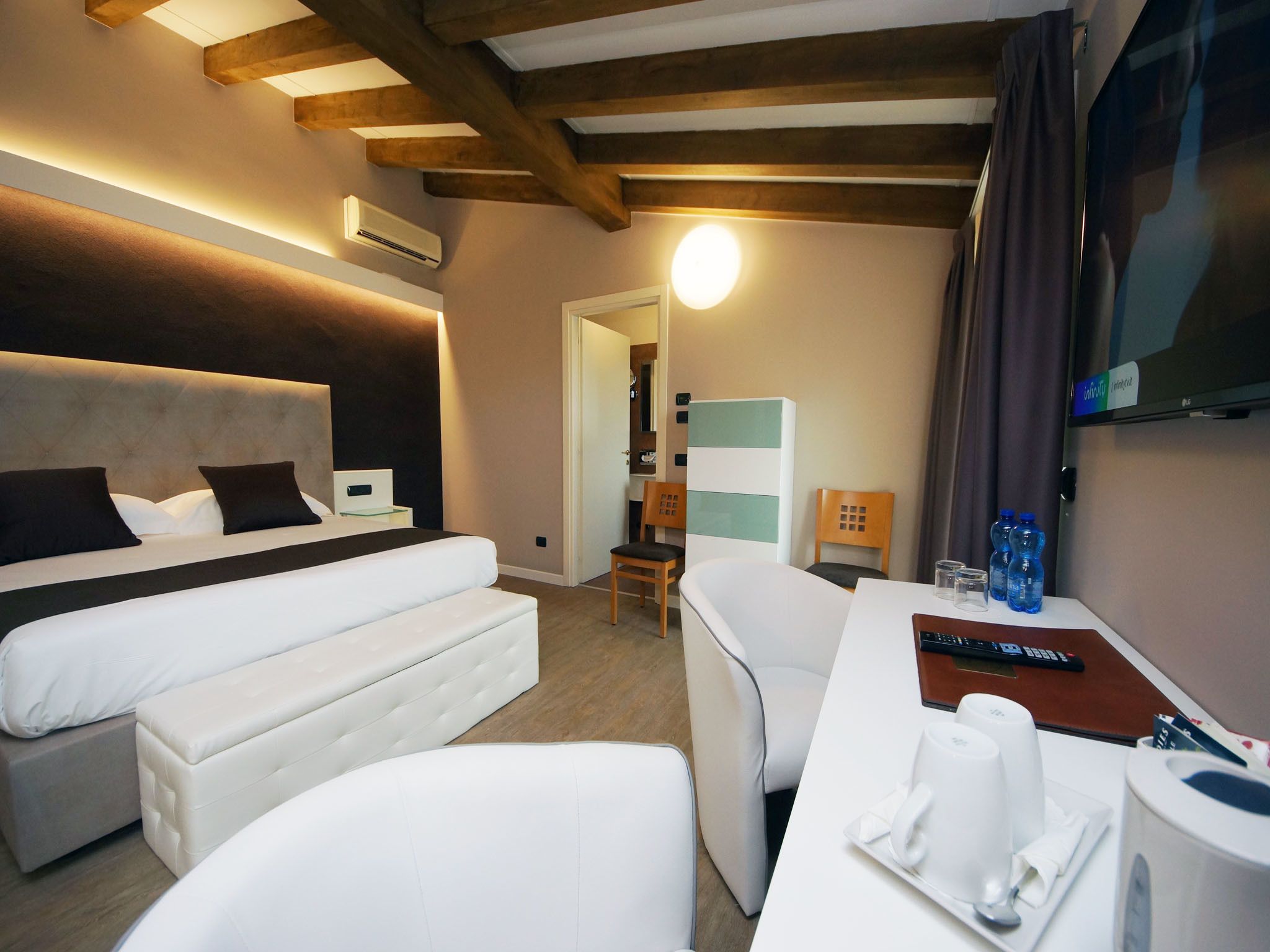 quadruple room | premium bedding, minibar, in-room safe, desk