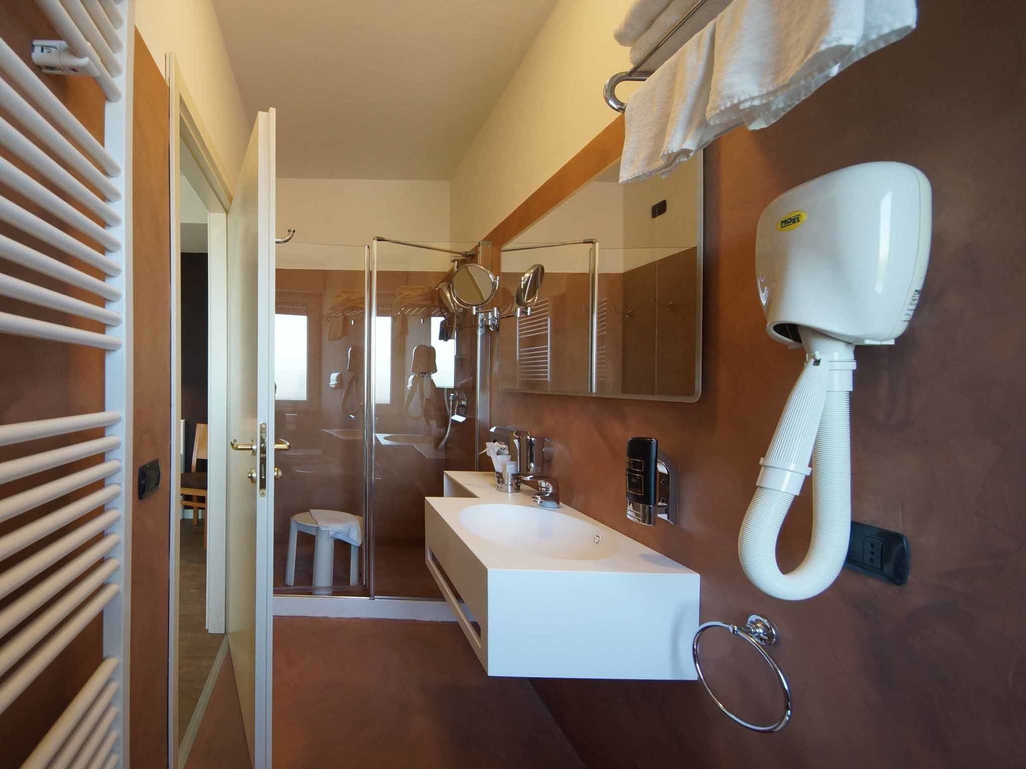 quadruple room | premium bedding, minibar, in-room safe, desk