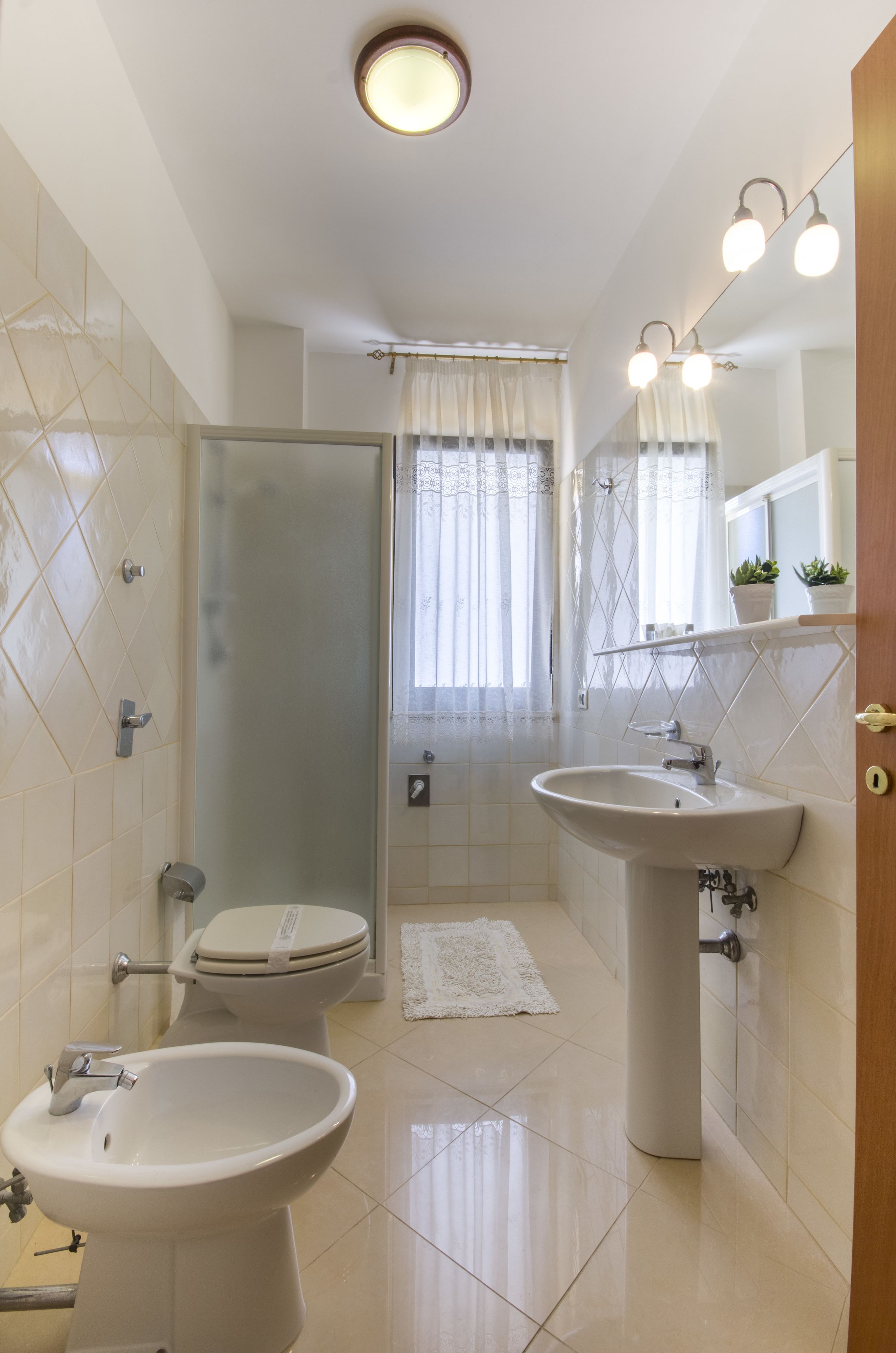 Apartment, 2 Bedrooms, Kitchen (4 people) | Bathroom | Free toiletries, hair dryer, bidet, towels