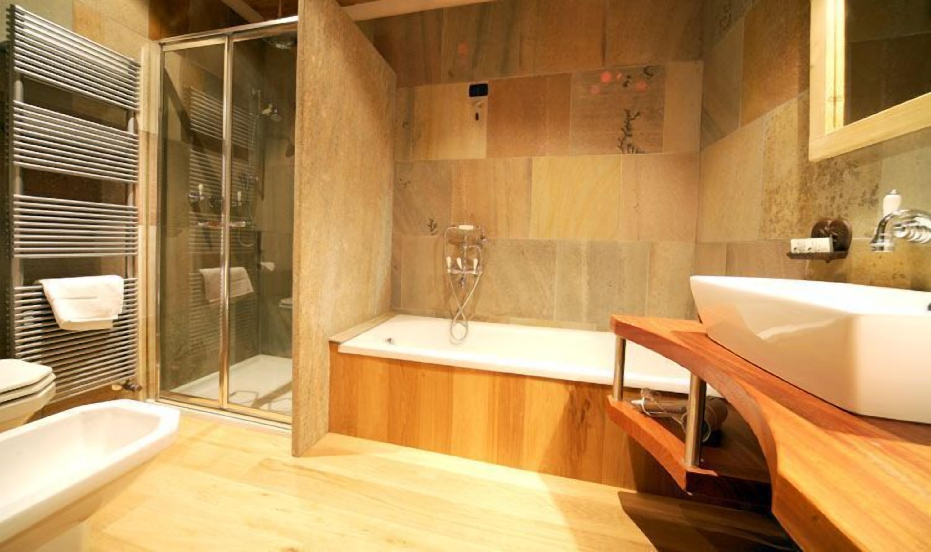 separate bathtub and shower, rainfall showerhead, hair dryer, bathrobes