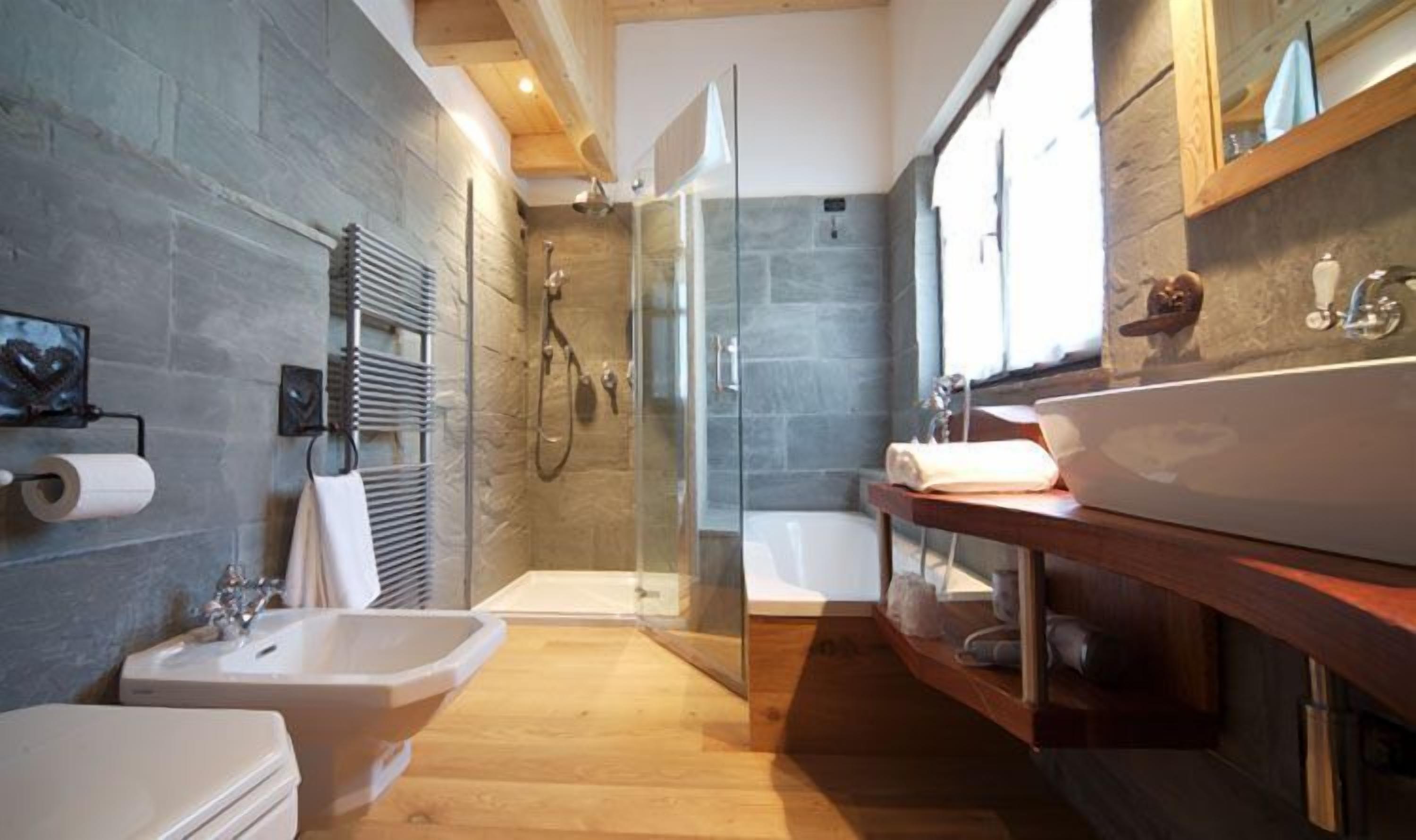 separate bathtub and shower, rainfall showerhead, hair dryer, bathrobes