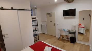 Desk, soundproofing, iron/ironing board, free cribs/infant beds