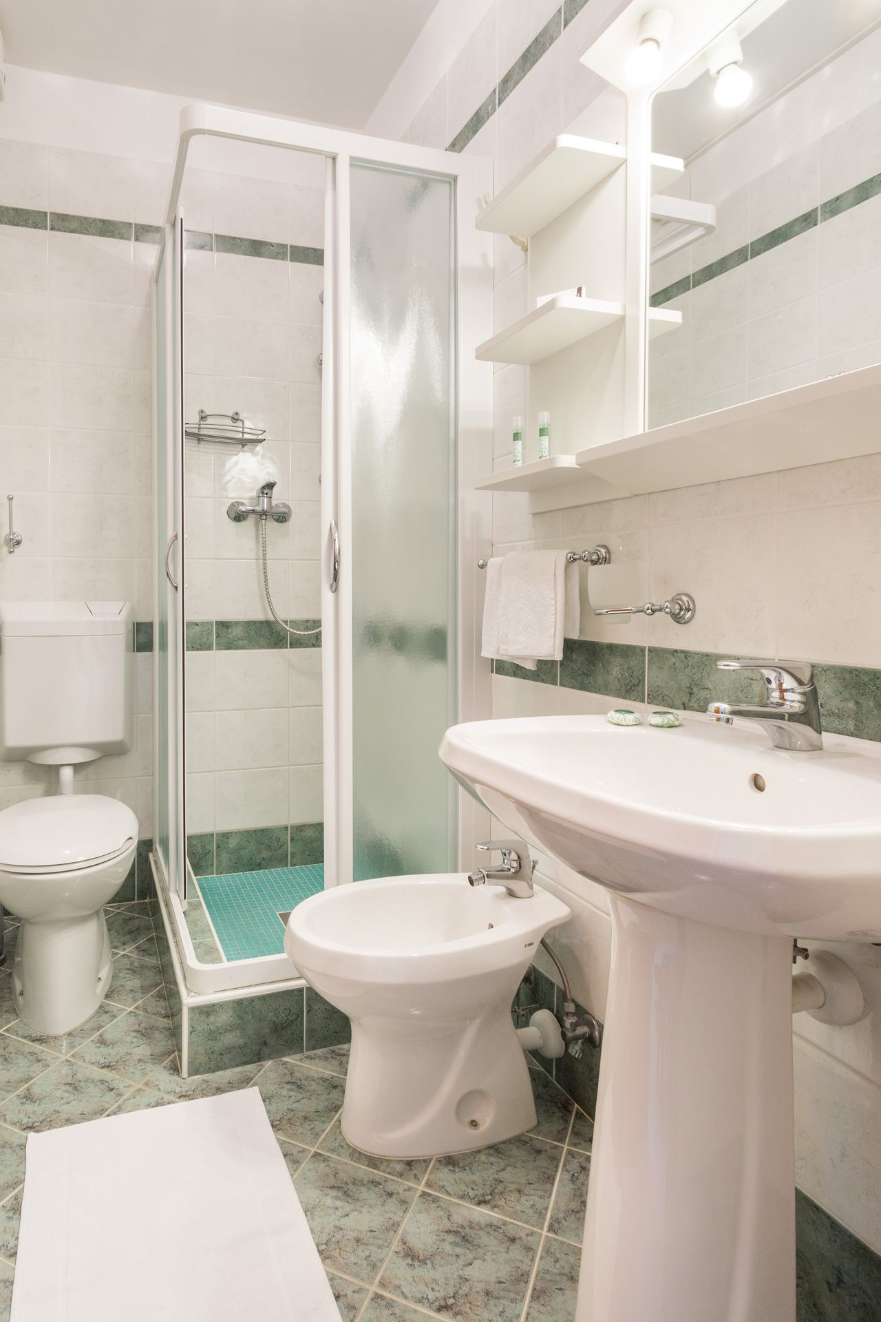 shower, free toiletries, hair dryer, slippers