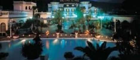 Indoor pool, outdoor pool, open 7:30 AM to 12:30 PM, pool umbrellas