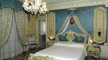 Frette Italian sheets, premium bedding, down comforters, minibar