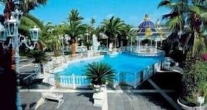 Indoor pool, outdoor pool, open 7:30 AM to 12:30 PM, pool umbrellas