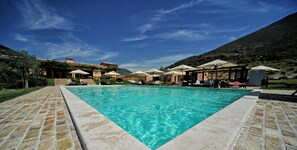 Outdoor pool, pool umbrellas, pool loungers