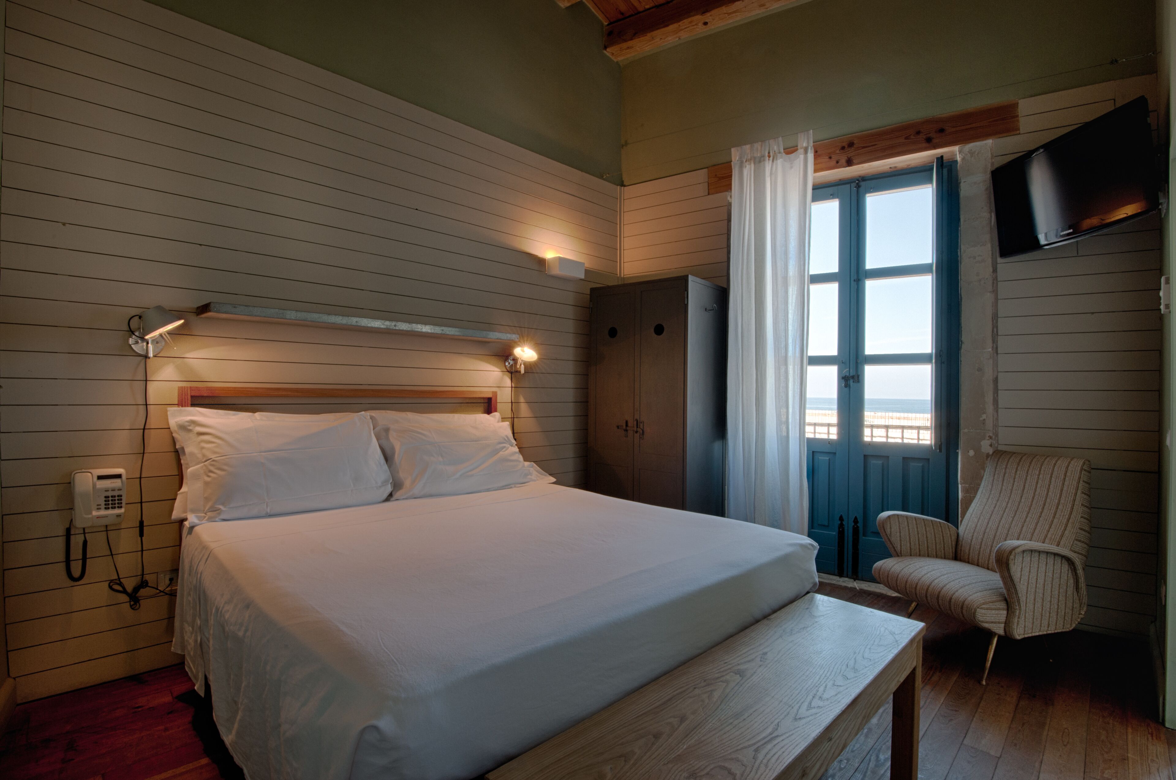double room, sea view | minibar, in-room safe, desk, iron/ironing board