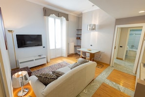 Apartment Executive | Living room | 55-inch Smart TV with digital channels, TV