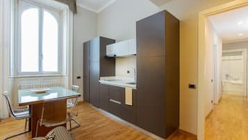 Family Apartment | Living area | 55-inch Smart TV with digital channels, TV