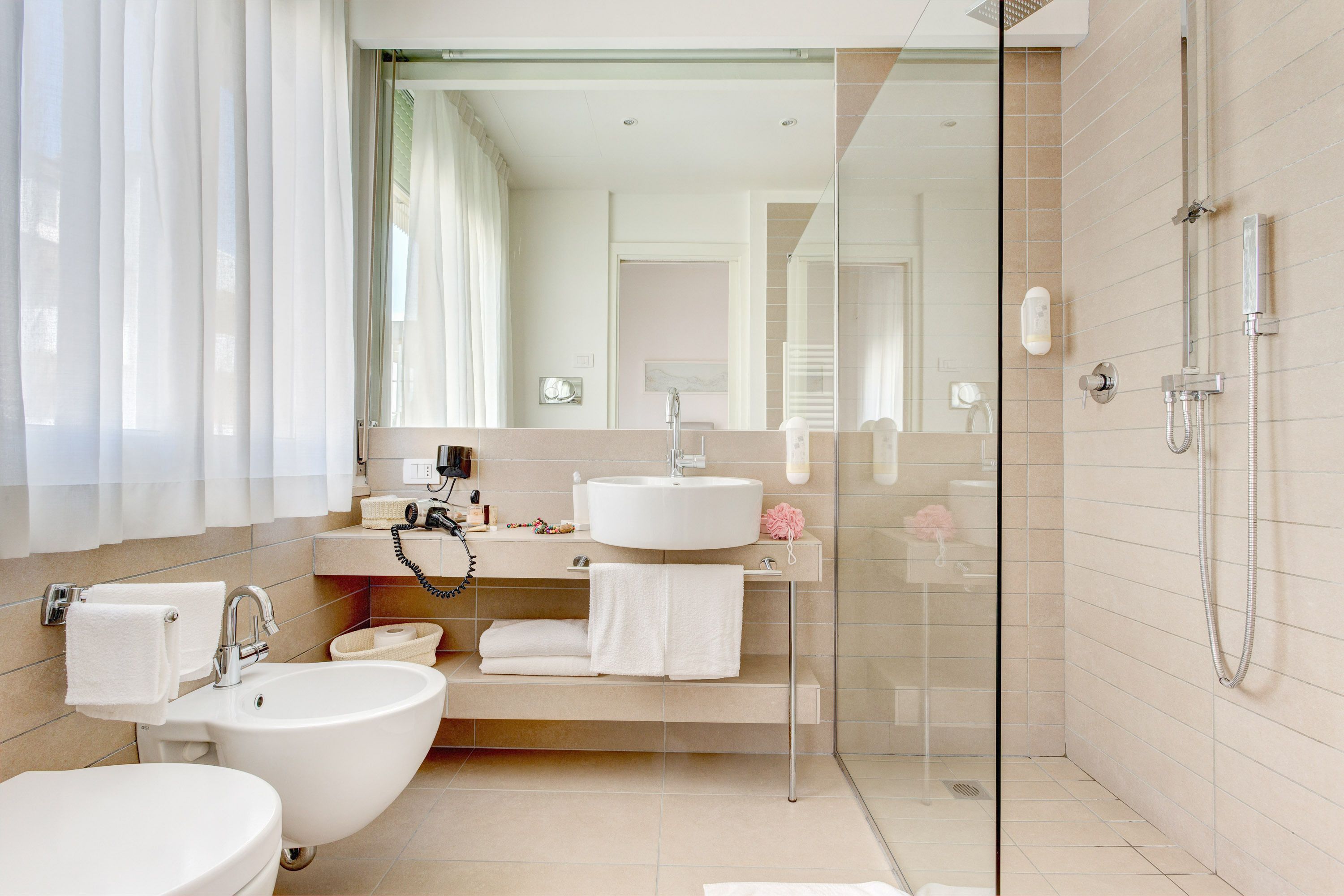 superior triple room | bathroom | shower, free toiletries, hair dryer, bidet