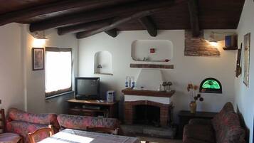 Standaard appartement | Woonruimte | Flatscreentelevisie