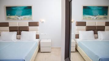 Family Apartment, 2 Bedrooms | Pillow-top beds, in-room safe, individually furnished, free WiFi