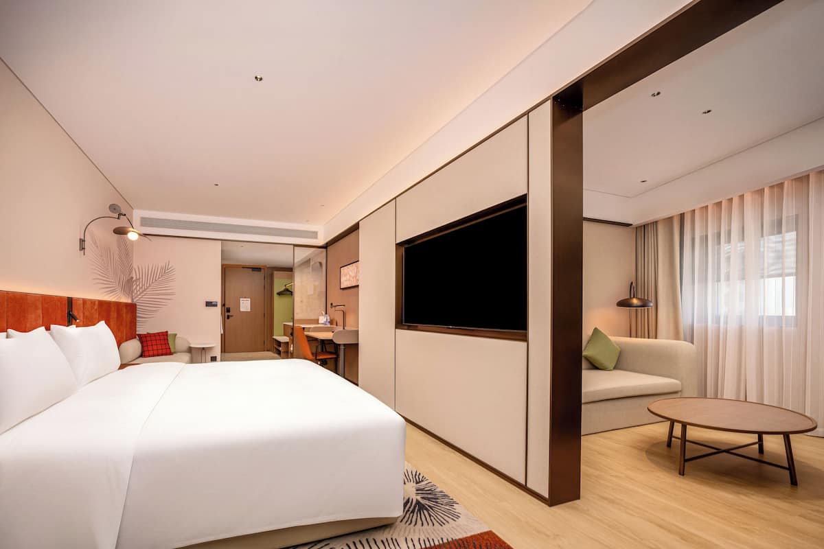 Habitación Deluxe, 1 cama King size y sofá cama | Tabla de planchar con plancha y wifi gratis