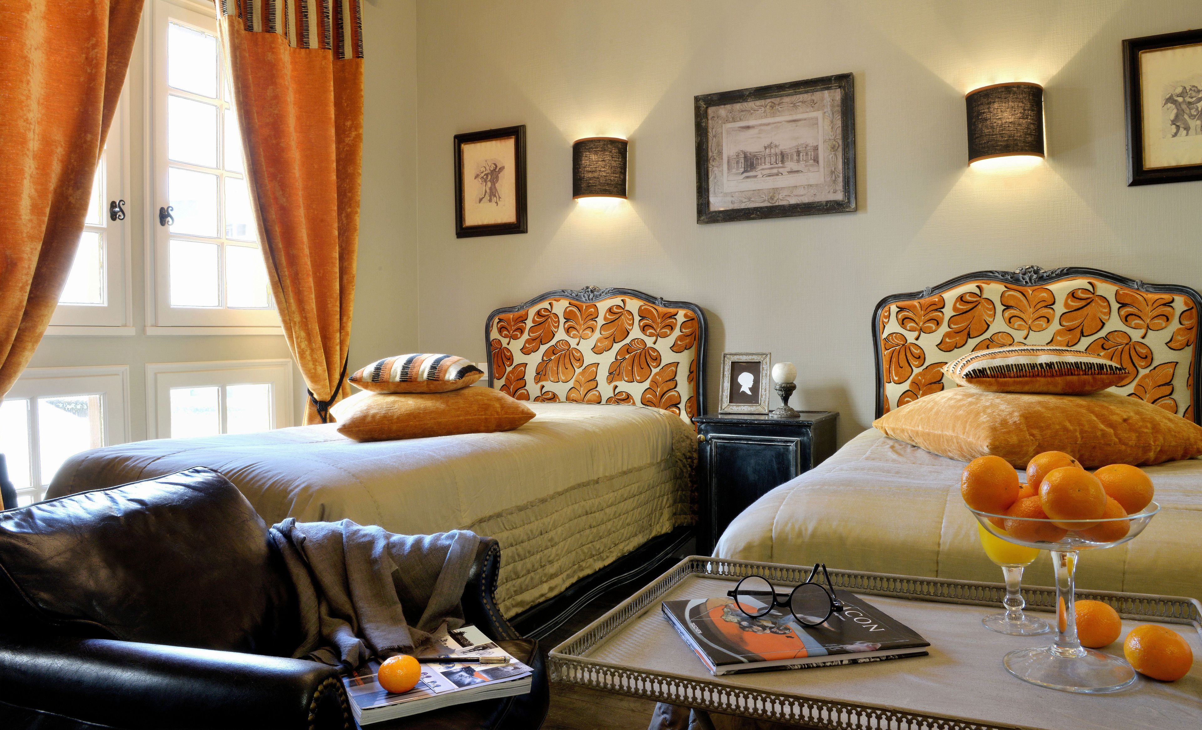 deluxe twin room | pillow-top beds, minibar, in-room safe, individually decorated