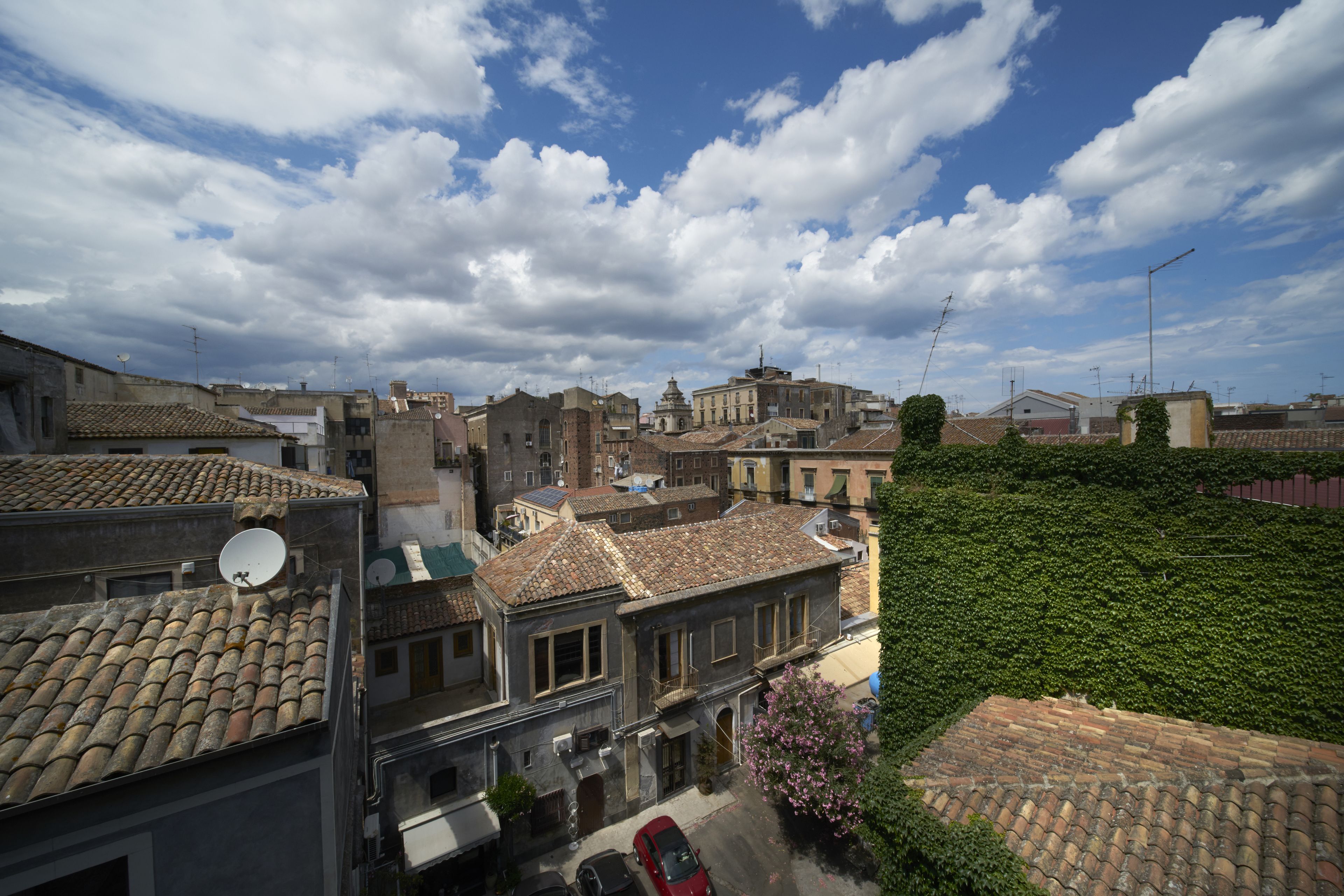 A historic town with traditional architecture, narrow streets, and a mix of residential and commercial buildings.