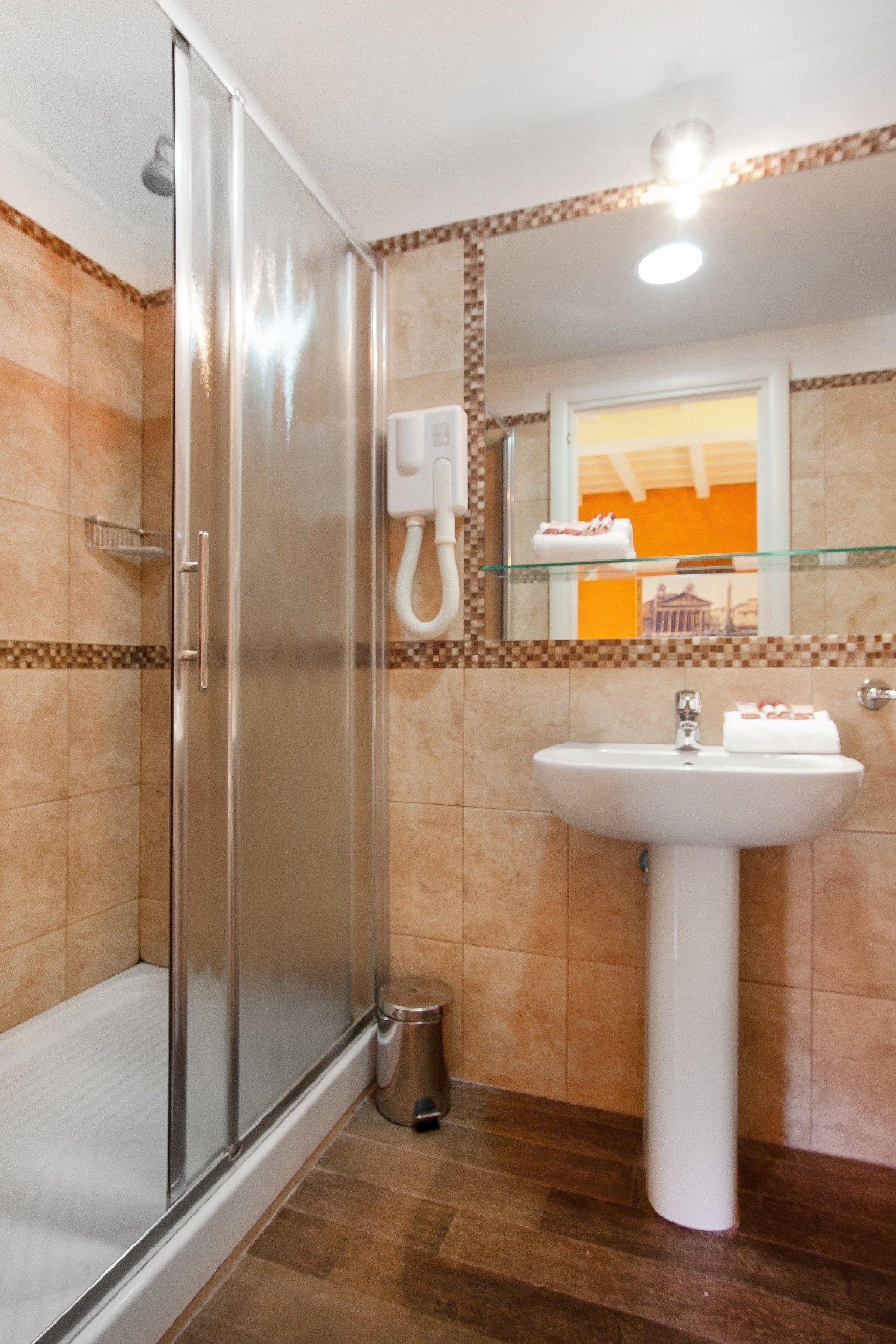 hair dryer, bathrobes, bidet, towels