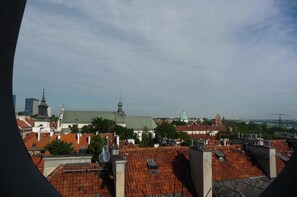 A cityscape with a prominent church and a modern building in the background. - Duval Serviced Apartments (Warsaw)