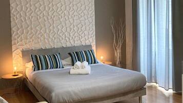 Deluxe Room, 1 Bedroom, Balcony, City View | Frette Italian sheets, premium bedding, down comforters