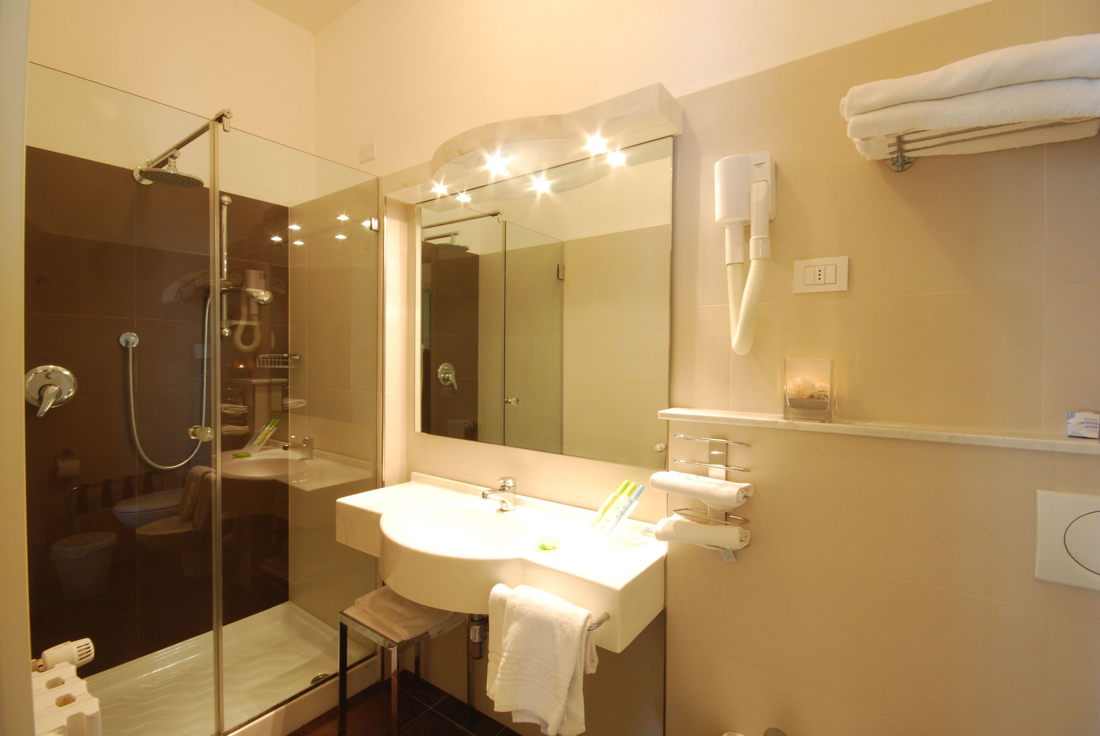 shower, hair dryer, bathrobes, slippers