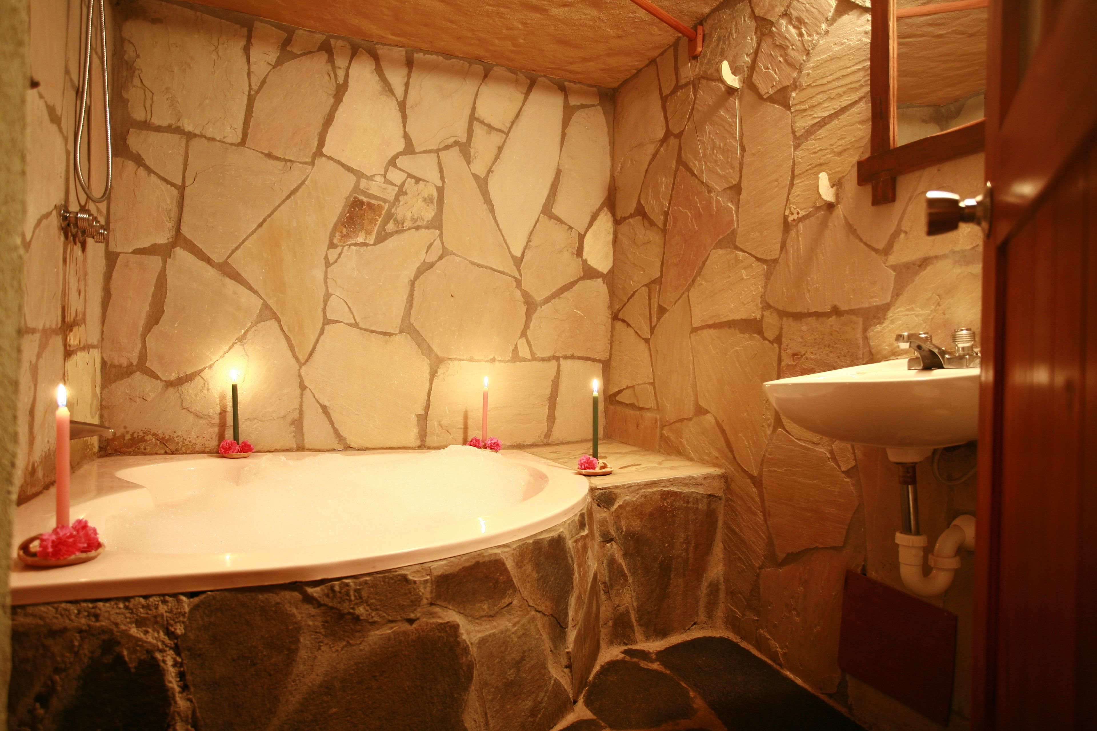 suite | bathroom | rainfall showerhead, hair dryer, towels