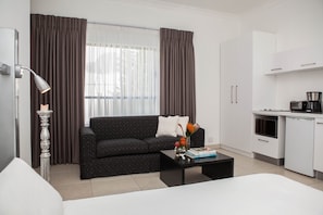 Apartment, Mountain View | Minibar, desk, blackout curtains, iron/ironing board