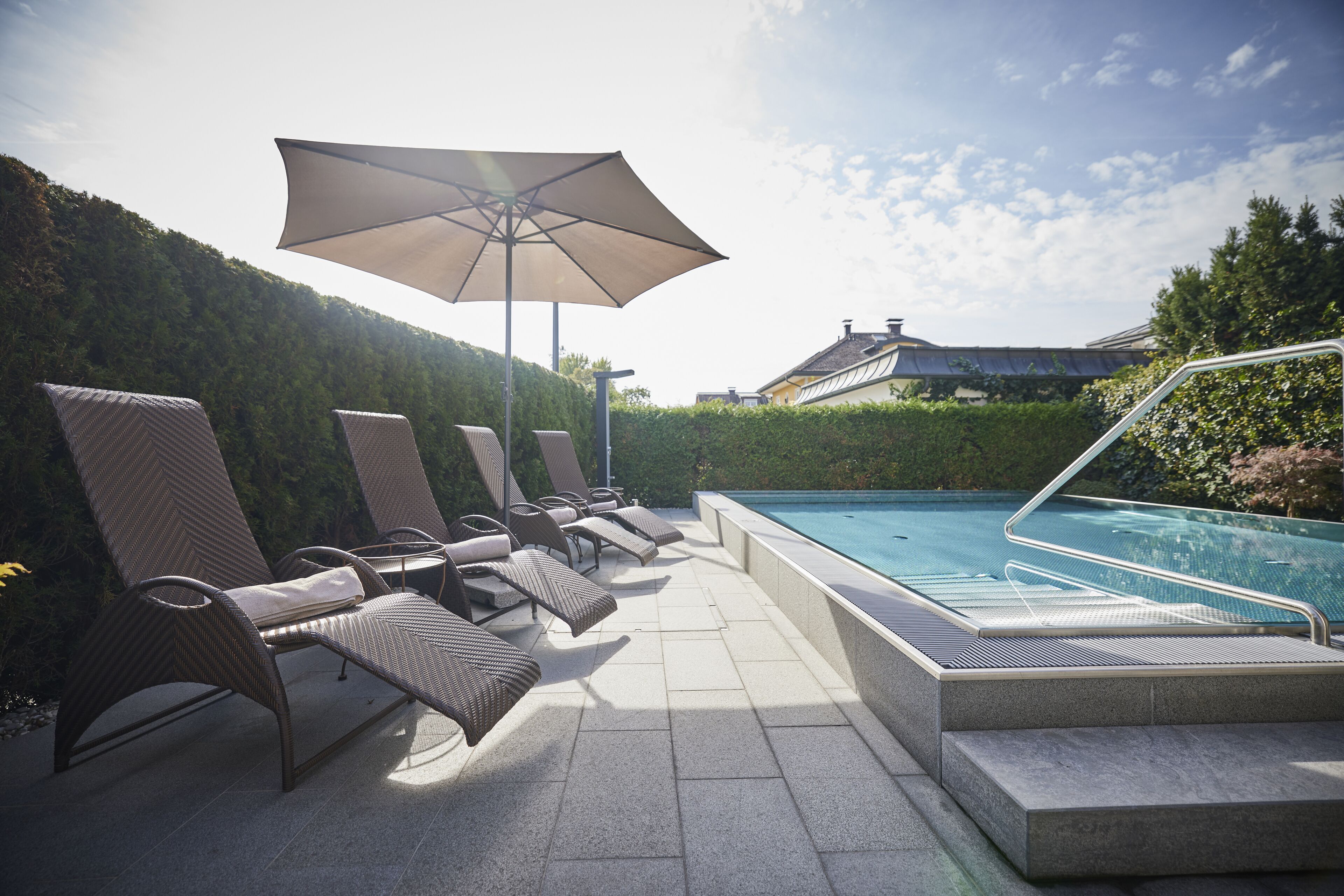 indoor pool, outdoor pool, pool umbrellas, pool loungers