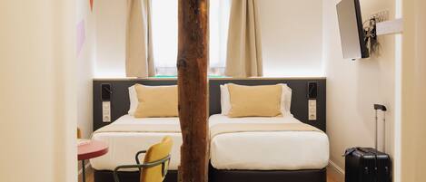 Premium bedding, down duvets, in-room safe, individually decorated