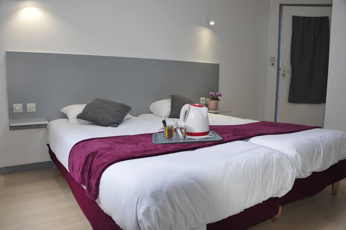 comfort room (1 or 2 people) | 1 bedroom, desk, blackout curtains, iron/ironing board