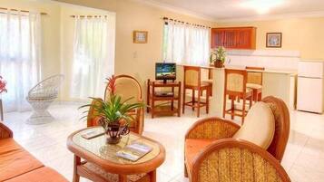 32-inch flat-screen TV with cable channels, TV