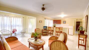 Suite, 2 Bedrooms (2 private bathrooms) | Living area | 32-inch flat-screen TV with cable channels, TV