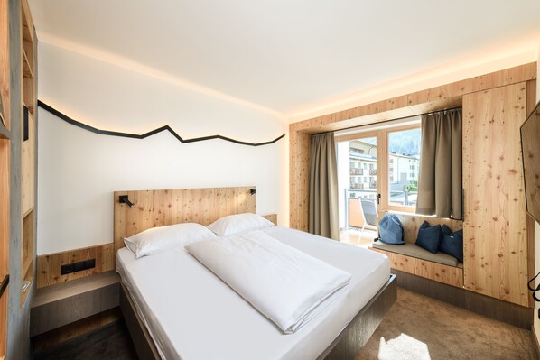 Jugendzimmer | Allergikerbettwaren, Minibar, Zimmersafe, Verdunkelungsvorhänge